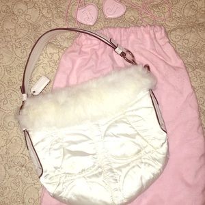 Fur coach purse